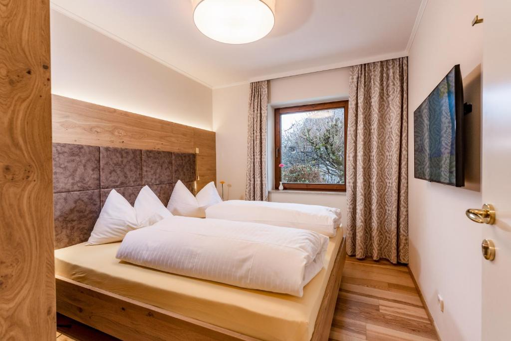 Postel nebo postele na pokoji v ubytování PARKVILLA Vital
