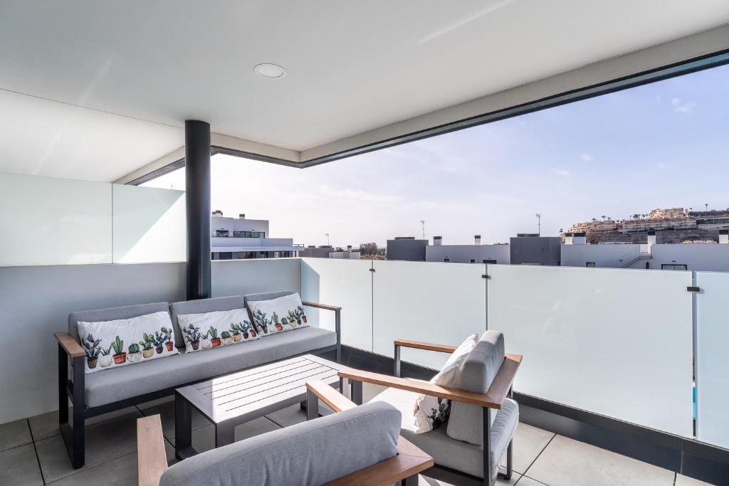 Balkón alebo terasa v ubytovaní 208 New luxury apartment Calaserena