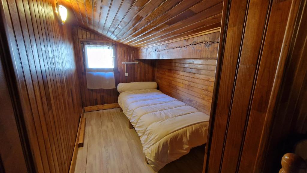 Posteľ alebo postele v izbe v ubytovaní Chalet l'Acinos