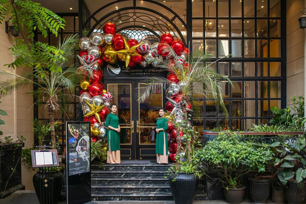 a christmas decoration on the front of a building at Lucien Hanoi Lakeside Hotel & Rooftop in Hanoi