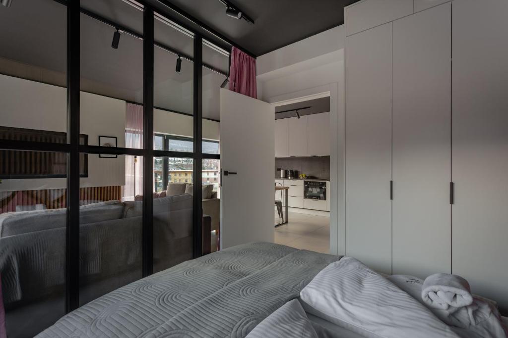 Posteľ alebo postele v izbe v ubytovaní Apart Invest Centrum Park 2