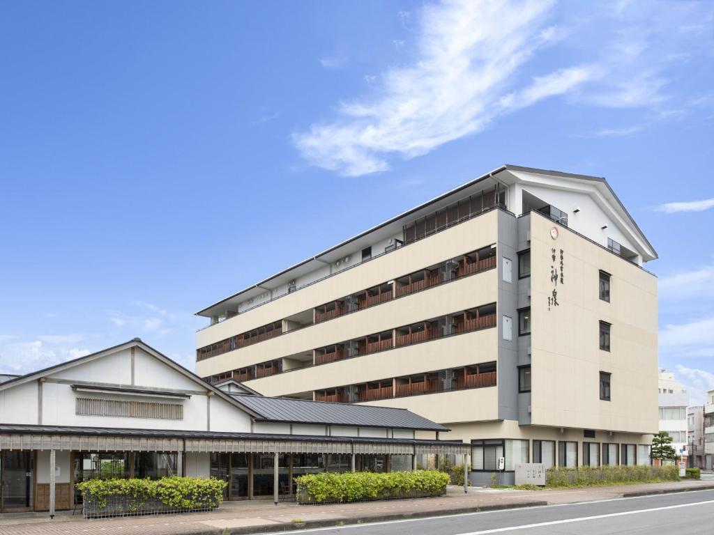 a large white building with a roof at Isegekusando Iseshinsen in Ise