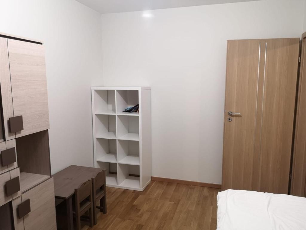 Posteľ alebo postele v izbe v ubytovaní Appartement Nowa Huta