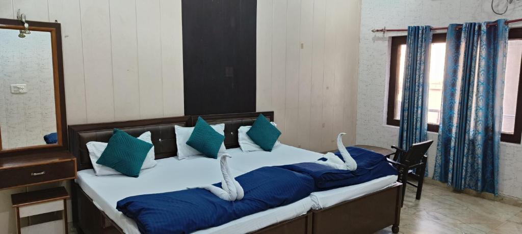 Voodi või voodid majutusasutuse BlueStays Hostel toas