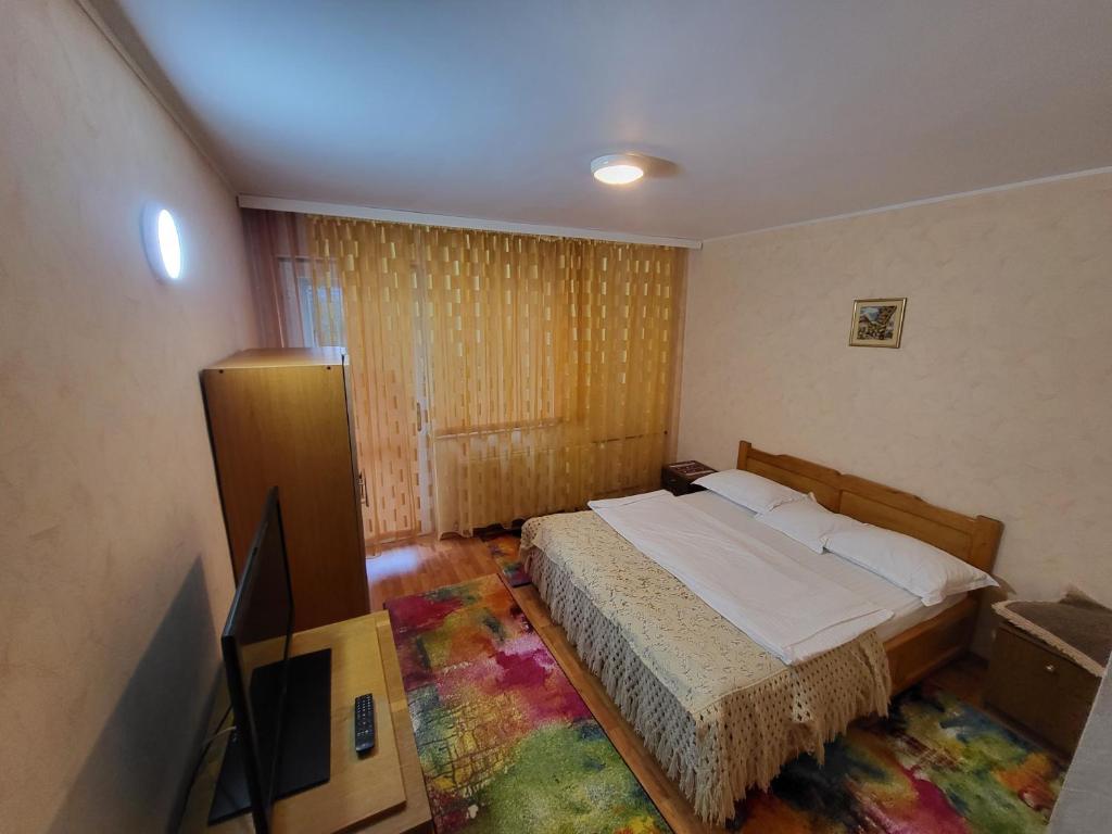 Postel nebo postele na pokoji v ubytování Vila Maya Predeal