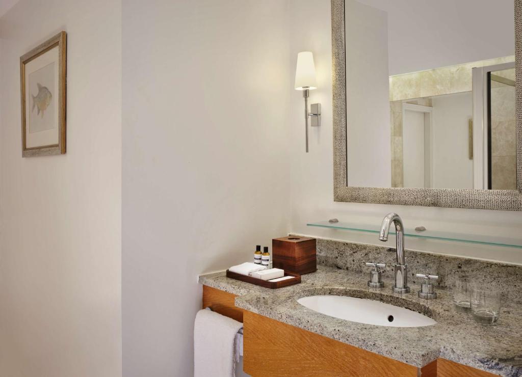 a bathroom with a sink and a mirror at Hyatt Regency Birmingham in Birmingham