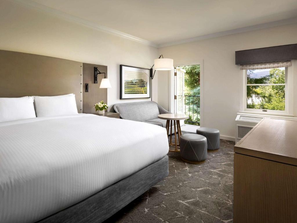 a hotel room with a bed and a desk at Fairmont Sonoma Mission Inn & Spa in Sonoma