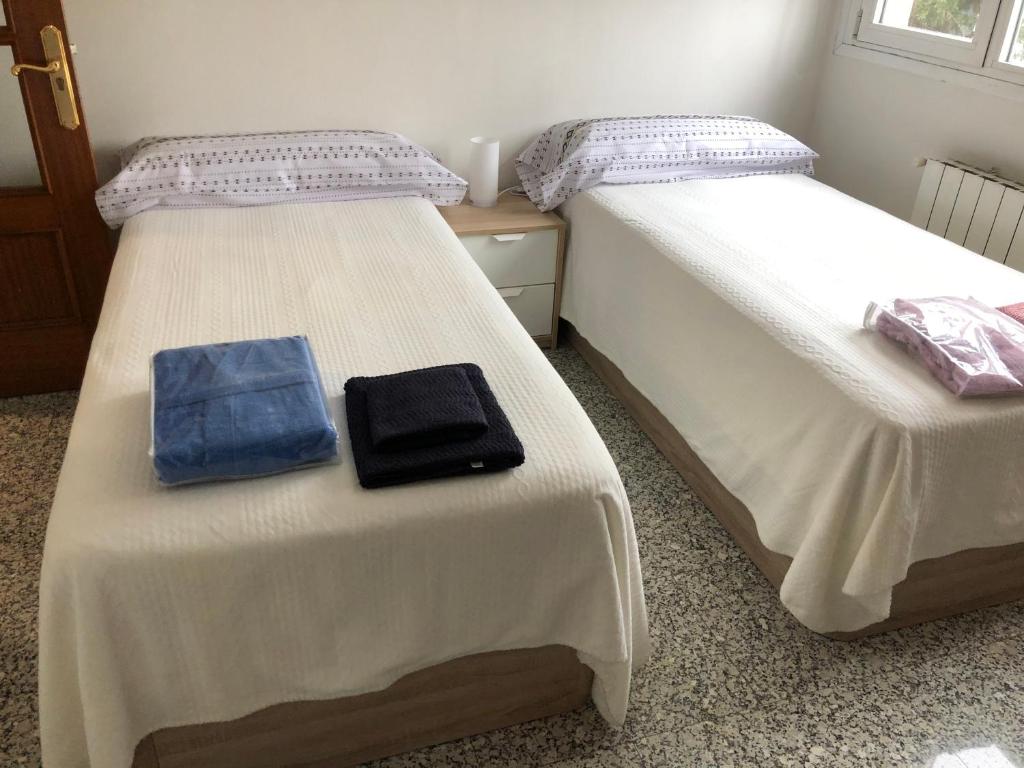 A bed or beds in a room at Luxury Apartment in Moncloa-Aravaca