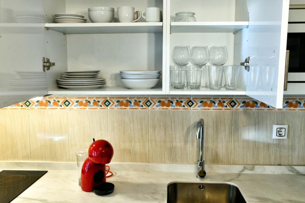 Kuchyňa alebo kuchynka v ubytovaní WonderStays Apartamentos Vela