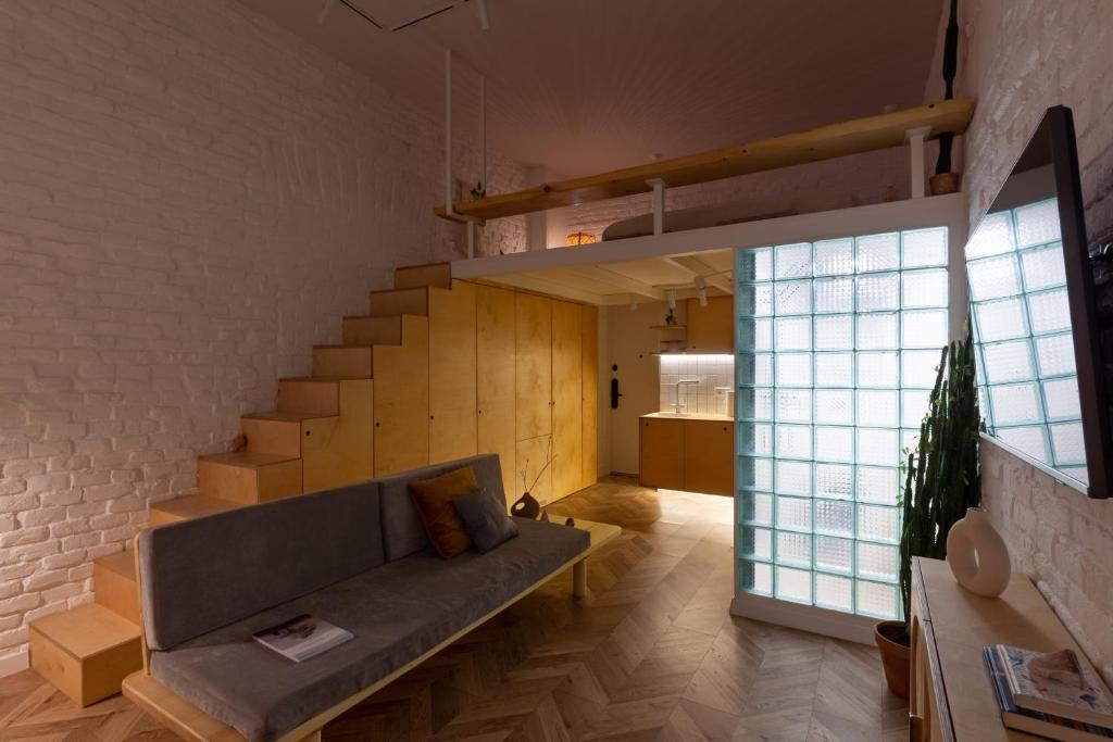 TV a/nebo společenská místnost v ubytování Passage Apartment