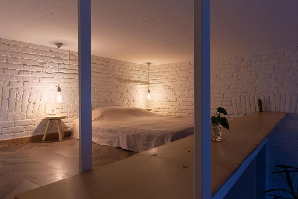 Postel nebo postele na pokoji v ubytování Passage Apartment