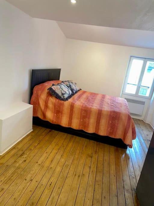 Postel nebo postele na pokoji v ubytování Maison atypique dans circulade