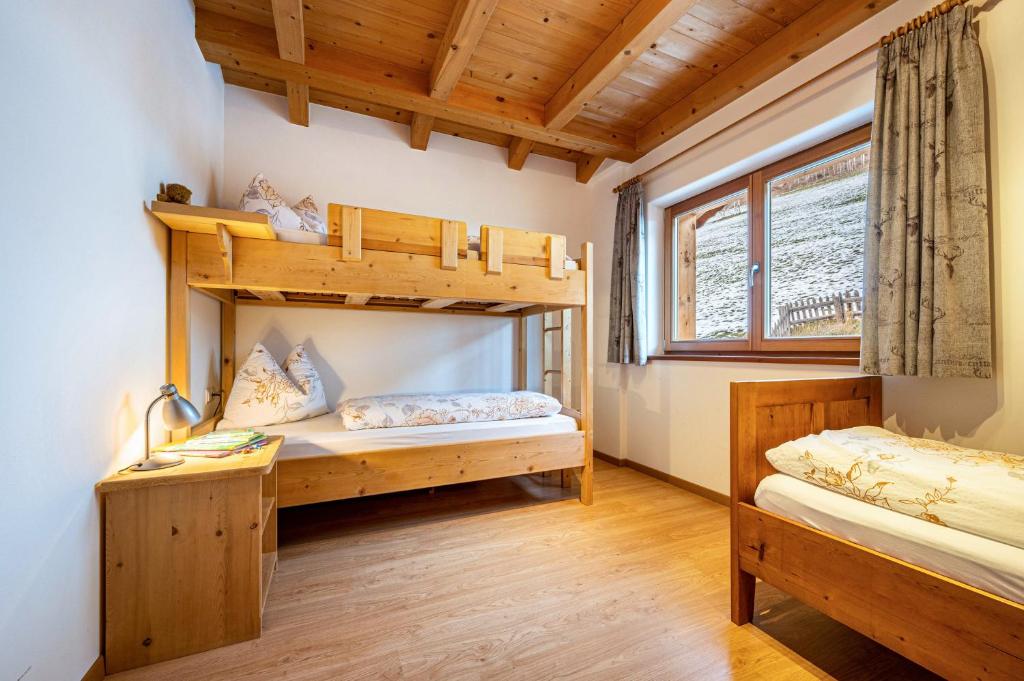 Postel nebo postele na pokoji v ubytování Raffreiderhof Apt Fichte