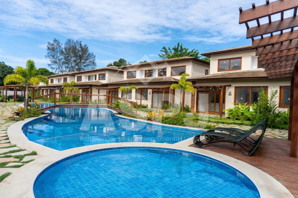 una piscina davanti a una casa di Barra Grande 129 a Marau