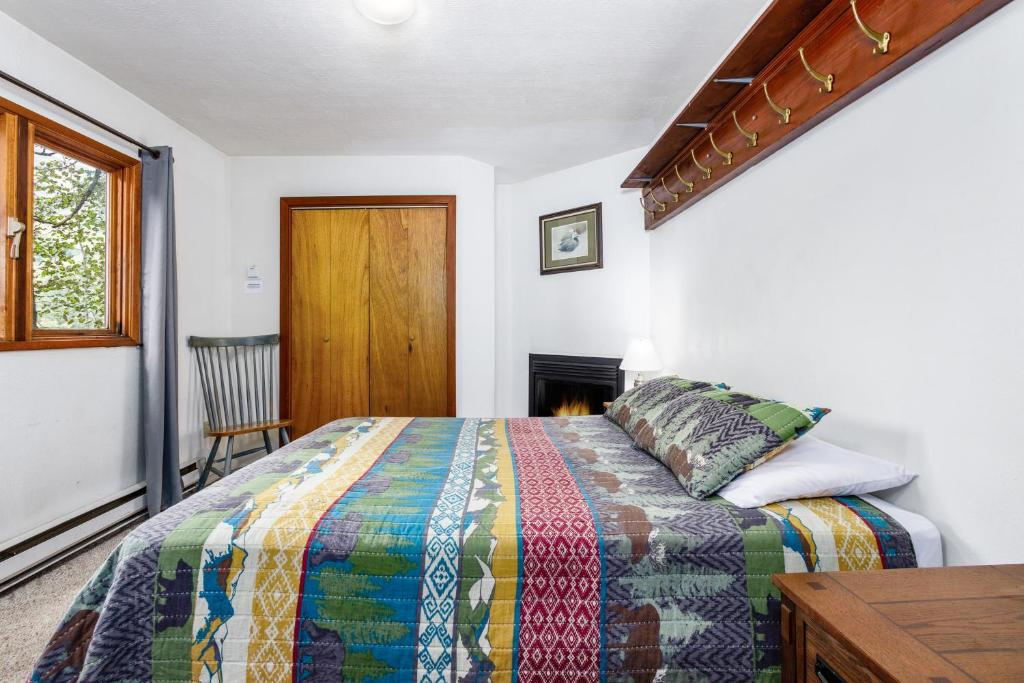 Postel nebo postele na pokoji v ubytování Vail Chalet