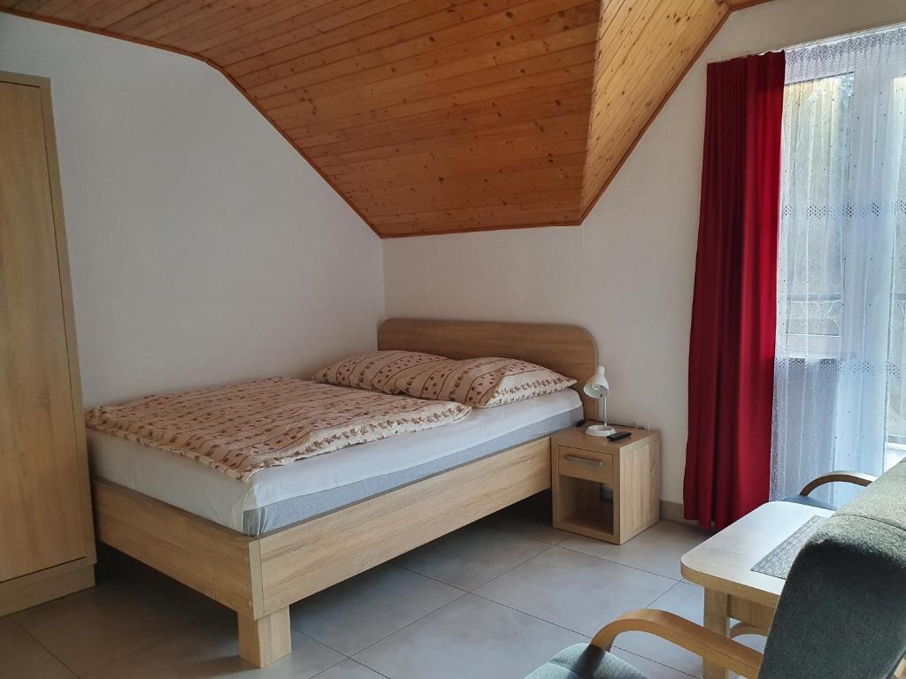 Łóżko lub łóżka w pokoju w obiekcie Willa OLA