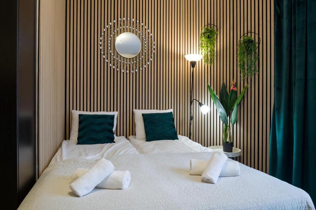 מיטה או מיטות בחדר ב-Modern apartment in best location