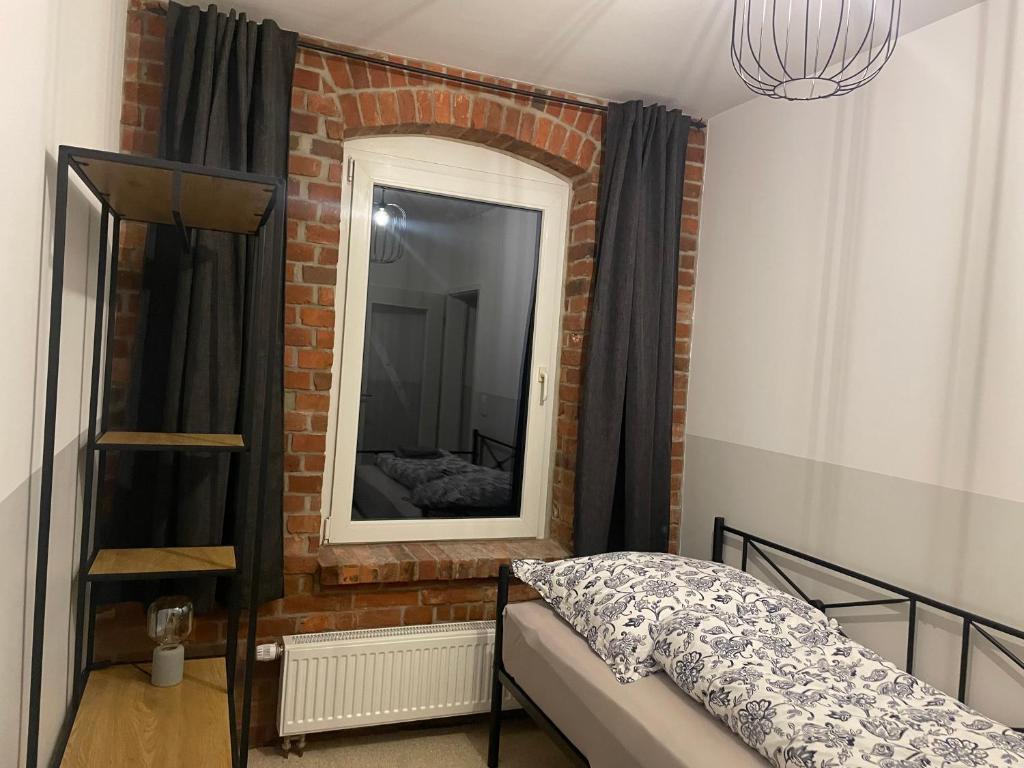 Postel nebo postele na pokoji v ubytování Apartment Hildesheim