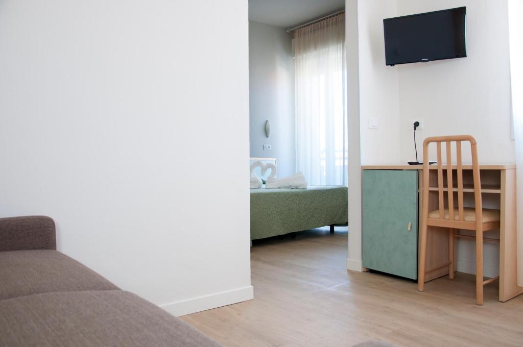 TV a/nebo společenská místnost v ubytování Hotel Ondina e Milazzo