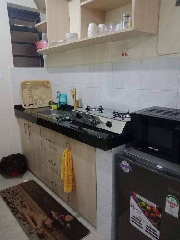 Kuchyň nebo kuchyňský kout v ubytování Eden's Studio apartment