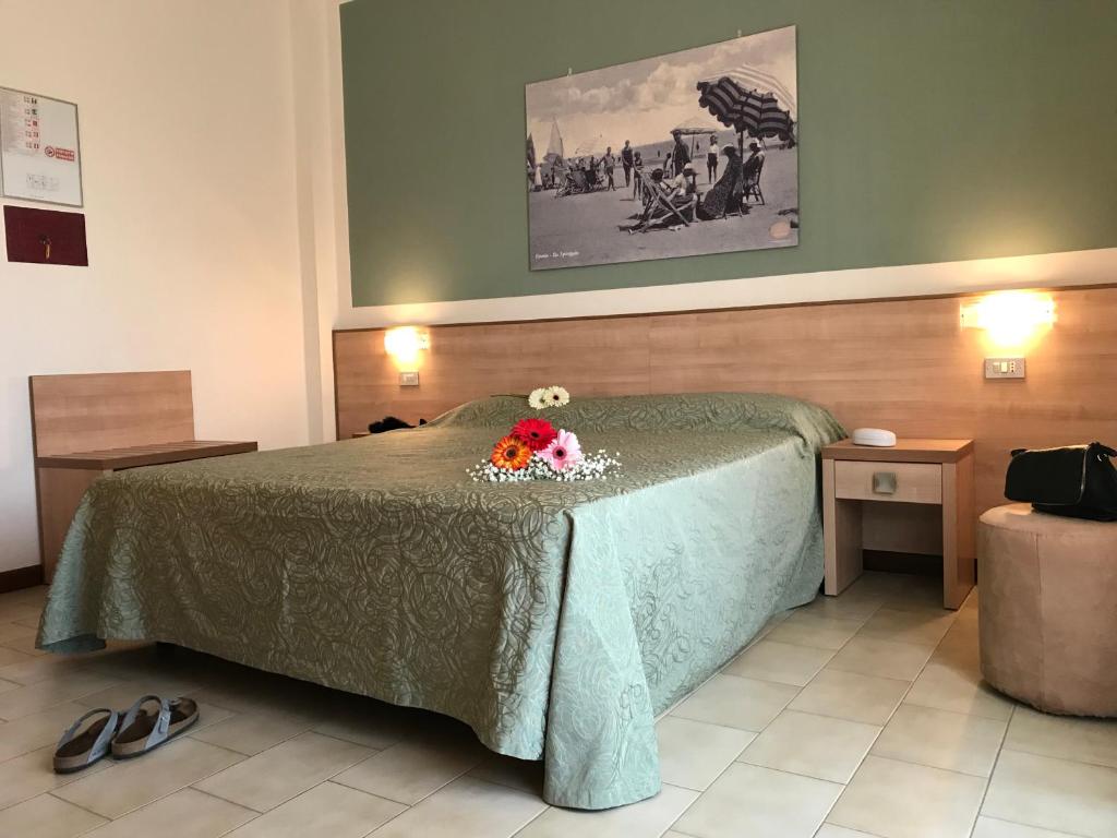 Postel nebo postele na pokoji v ubytování Hotel Ondina e Milazzo