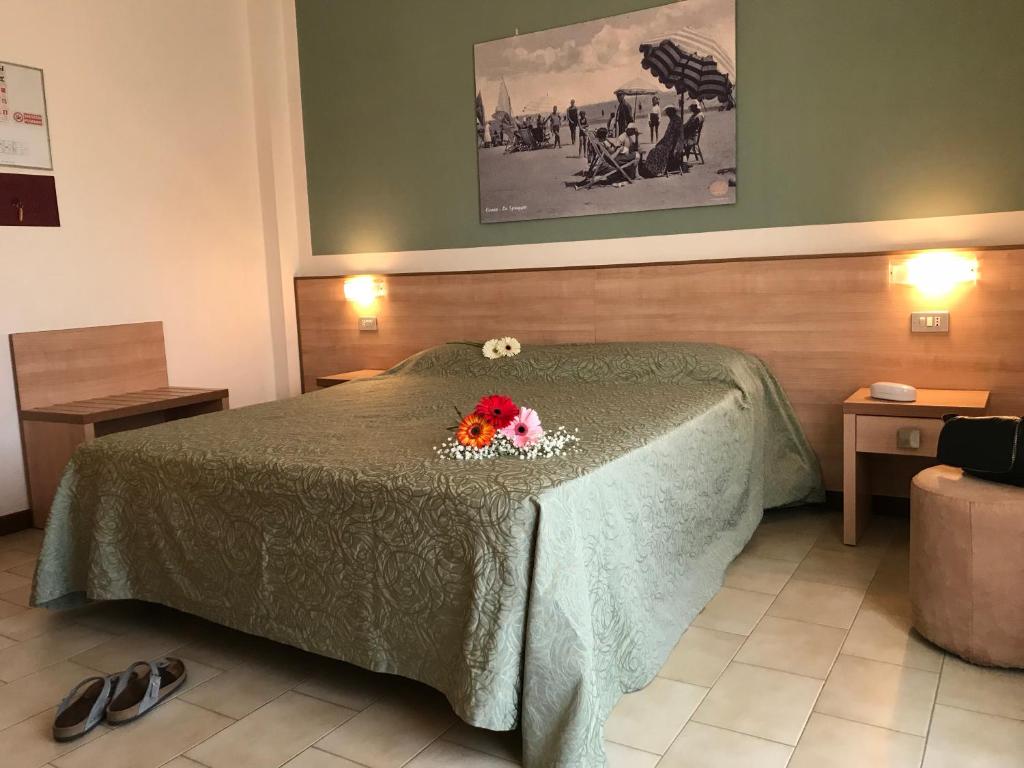 Postel nebo postele na pokoji v ubytování Hotel Ondina e Milazzo
