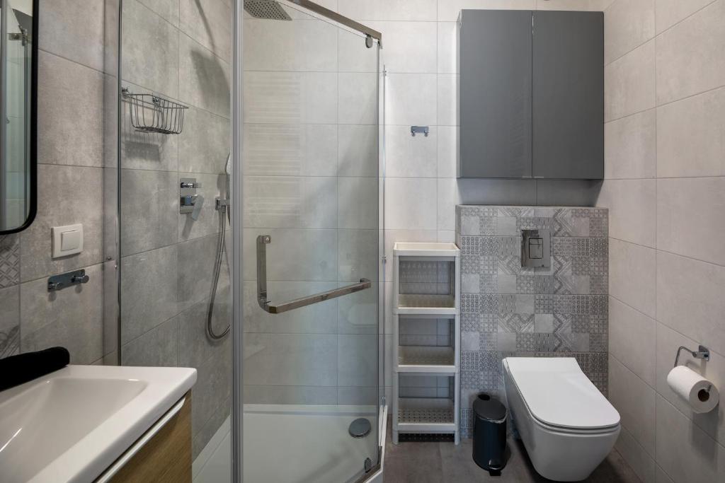 Kúpeľňa v ubytovaní Apartament Słoneczny z tarasem i ogrodem