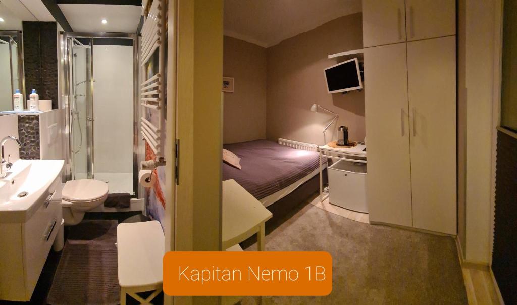 Posteľ alebo postele v izbe v ubytovaní Apartamenty Ekslibris