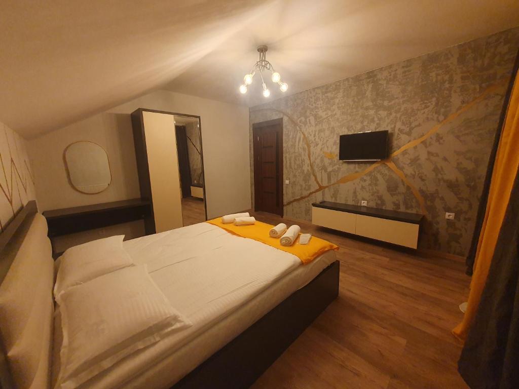 Postel nebo postele na pokoji v ubytování Gesh House