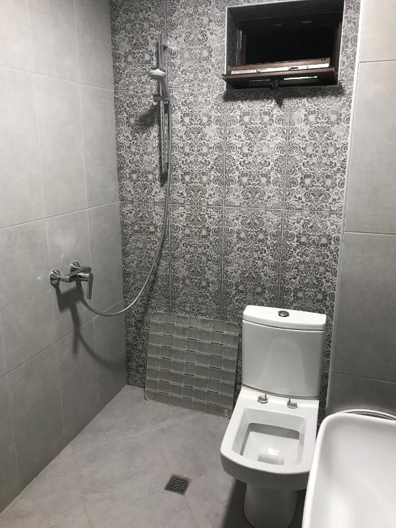 Koupelna v ubytování Hotel David Zhorzholiani