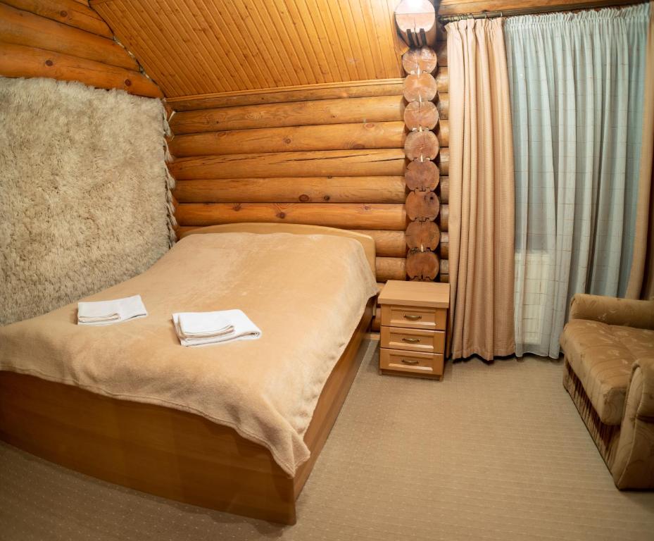 Postel nebo postele na pokoji v ubytování Mini Hotel Laplandiya