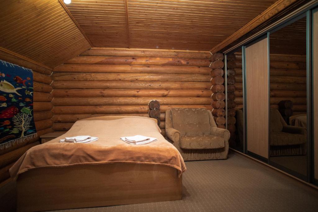 Postel nebo postele na pokoji v ubytování Mini Hotel Laplandiya