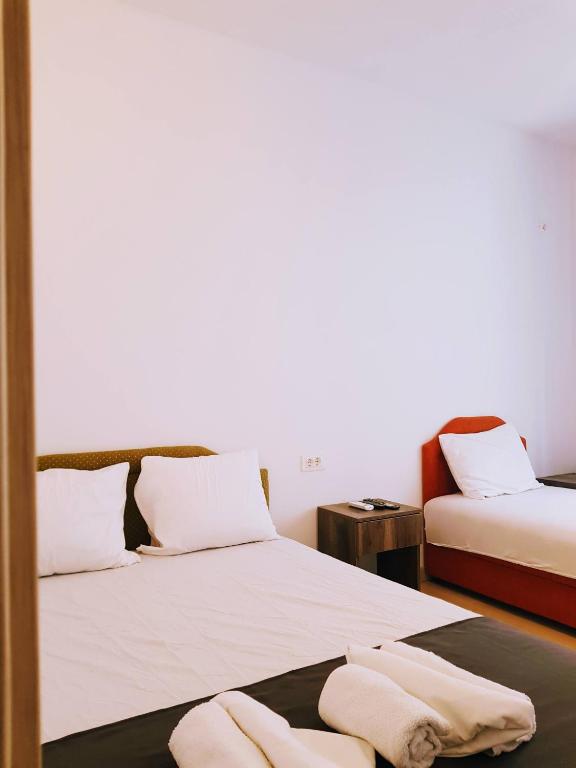 Postel nebo postele na pokoji v ubytování Villa Alba Apartments