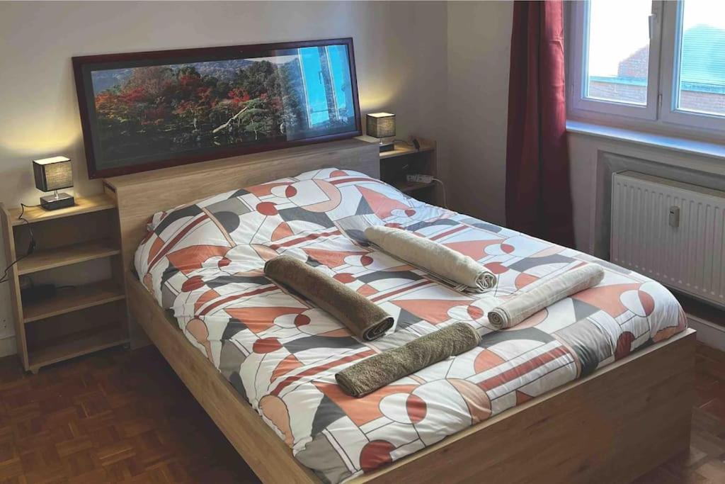 Posteľ alebo postele v izbe v ubytovaní appartement in center