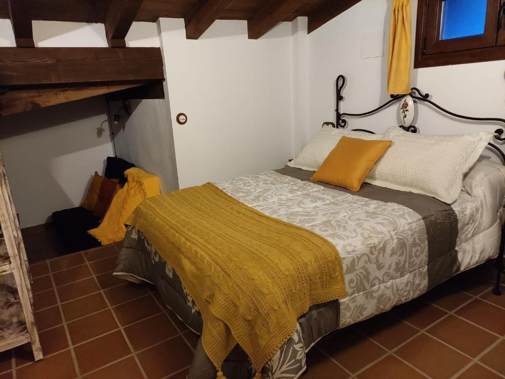 Postel nebo postele na pokoji v ubytování La casa de la abuela Amalia