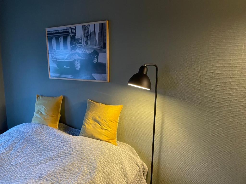 Postel nebo postele na pokoji v ubytování Jonstrupvejens Apartments Lejl C