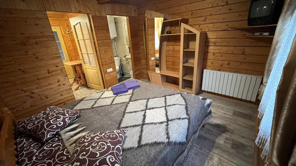 Postel nebo postele na pokoji v ubytování Sadyba Dana
