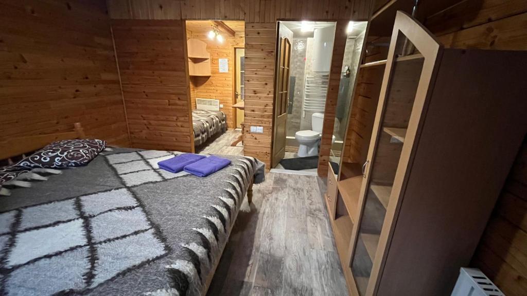 Postel nebo postele na pokoji v ubytování Sadyba Dana