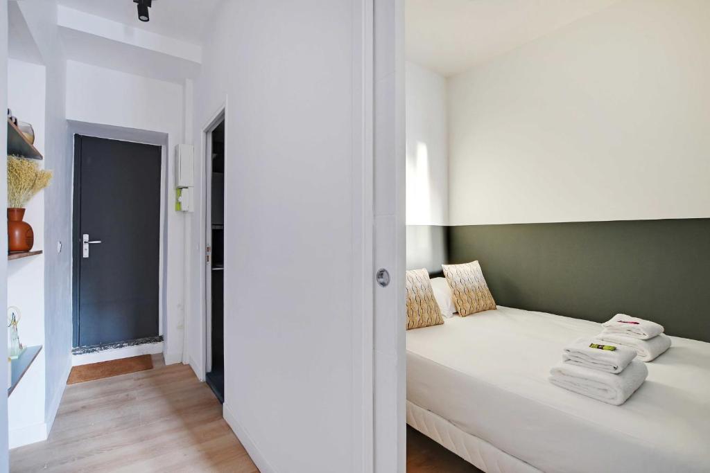 En eller flere senger p&aring; et rom p&aring; Charming apartment 2P1BR -Place d&#39;Italie Cit&eacute; Universitaire