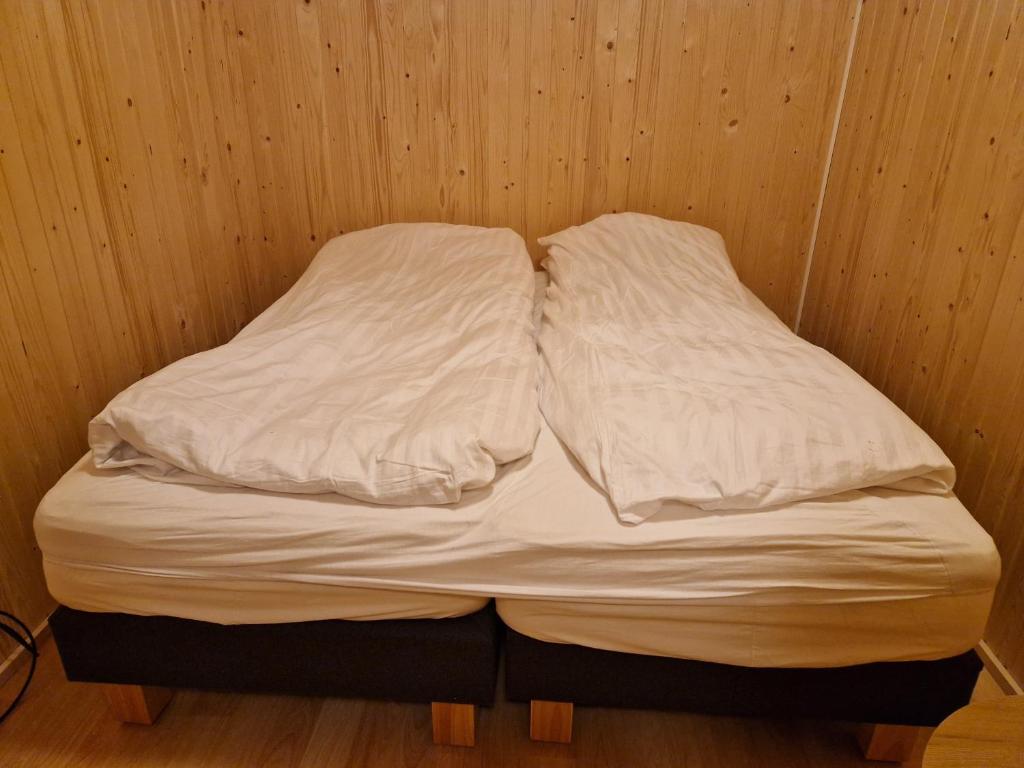 Postel nebo postele na pokoji v ubytování Mófellsstaðakot