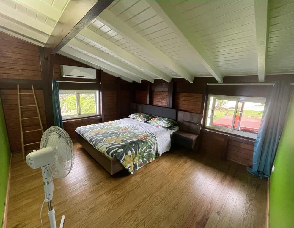 Postel nebo postele na pokoji v ubytování O'Chalet des îles