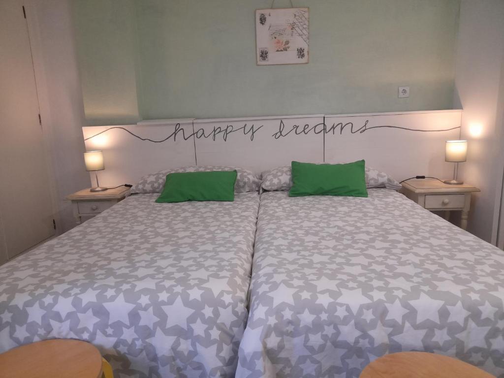 Postel nebo postele na pokoji v ubytování Estudio Carmen
