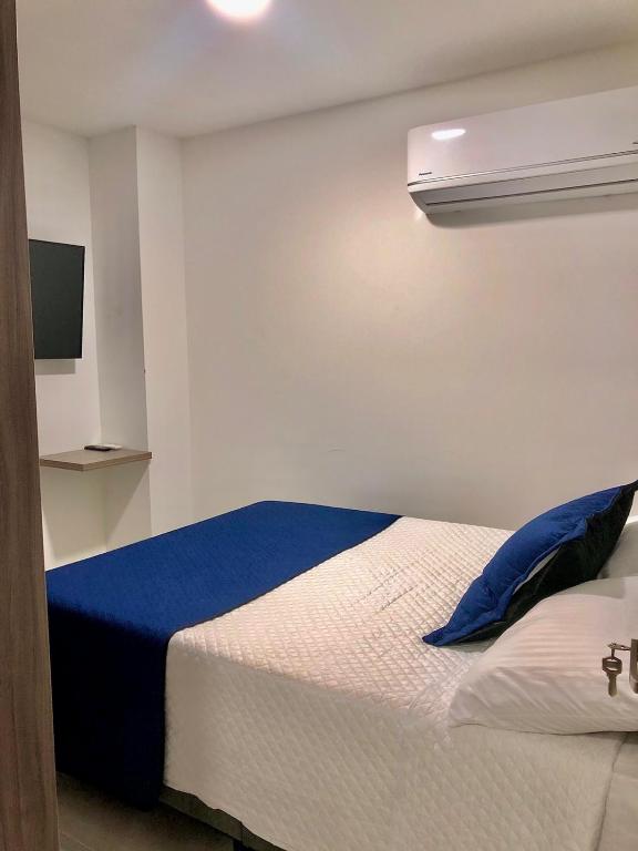 Cama o camas de una habitación en Espectacular Apartamento Caney 401