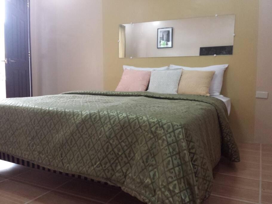 Postel nebo postele na pokoji v ubytování JW Apartments