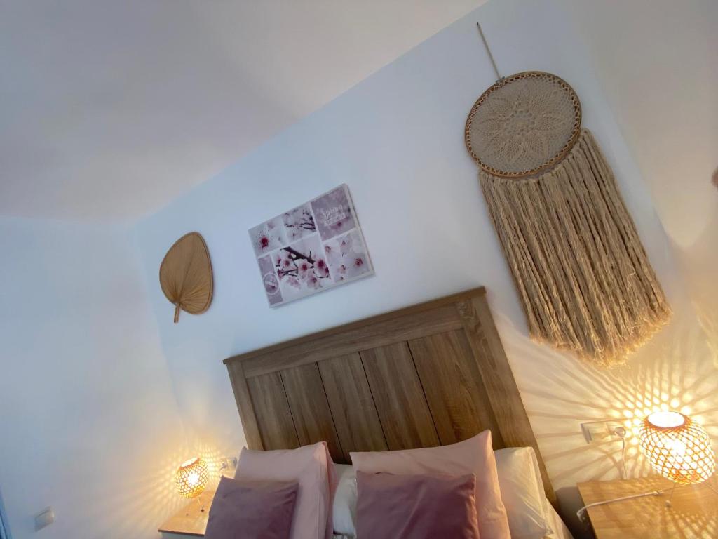 Postel nebo postele na pokoji v ubytování Iris Vistas Benalmadena