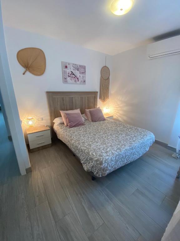 Postel nebo postele na pokoji v ubytování Iris Vistas Benalmadena