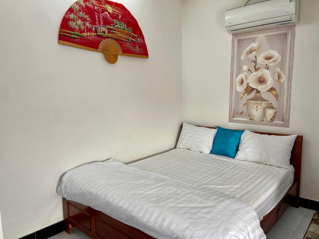 Postel nebo postele na pokoji v ubytování BOBE Homestay