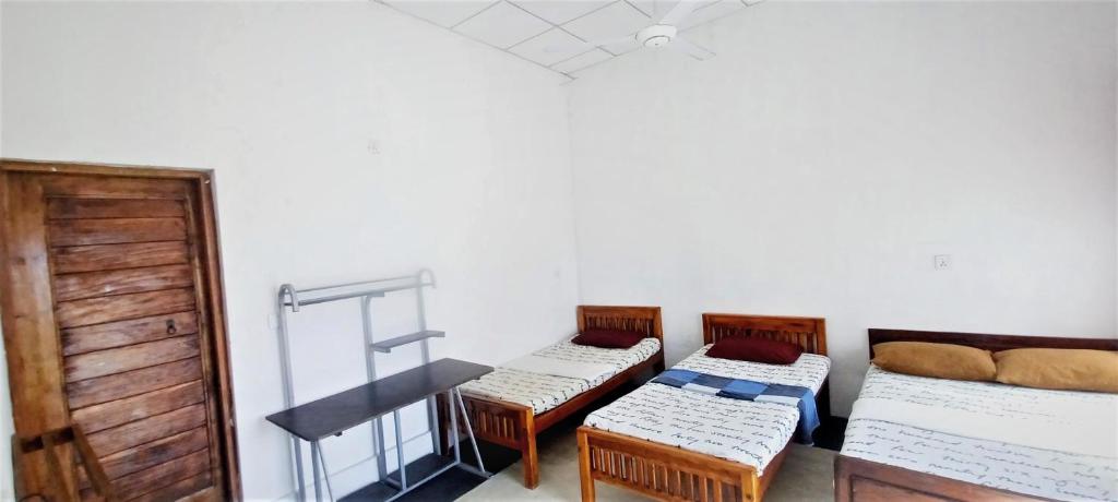 Postel nebo postele na pokoji v ubytování 20 House Villa