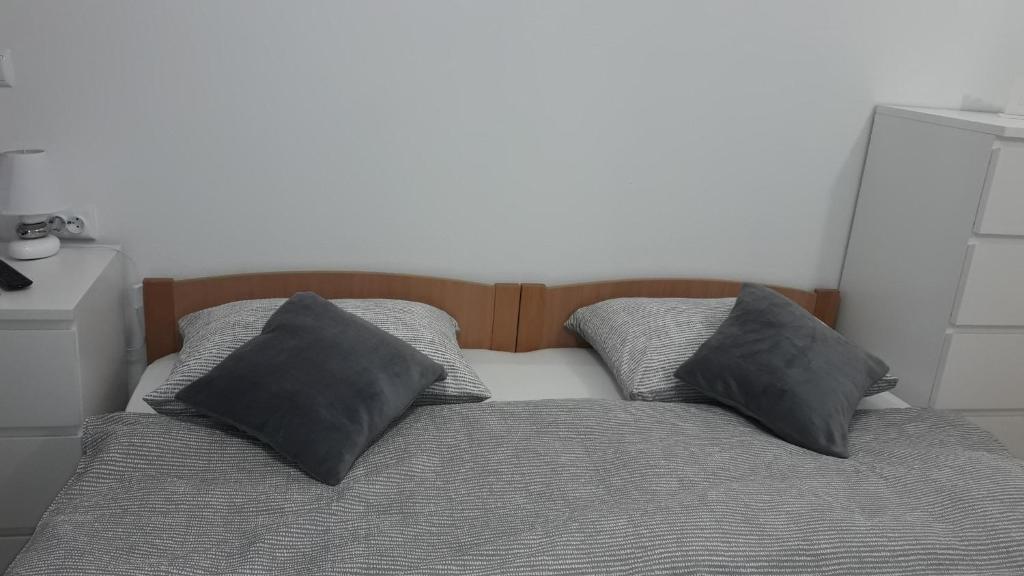 Posteľ alebo postele v izbe v ubytovaní Studio Apartment Nani Centar
