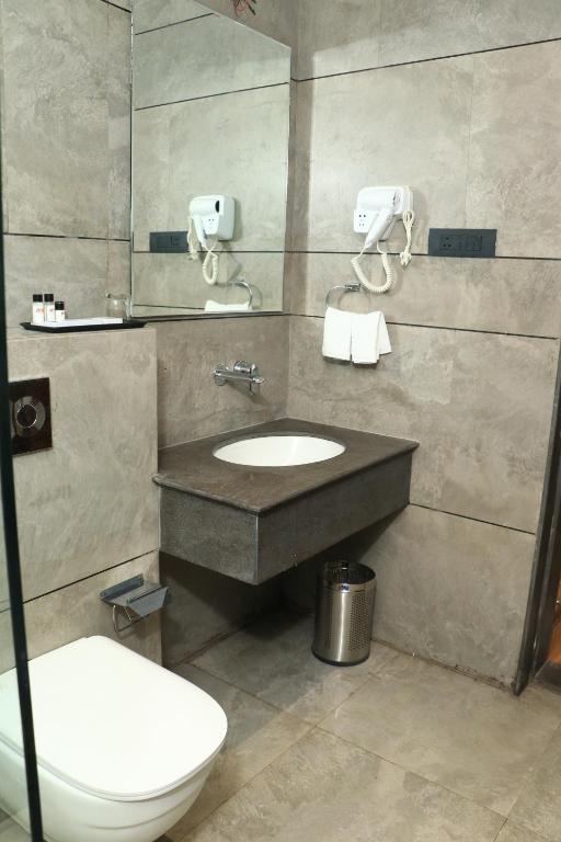 Koupelna v ubytování Hotel Rudra Royals